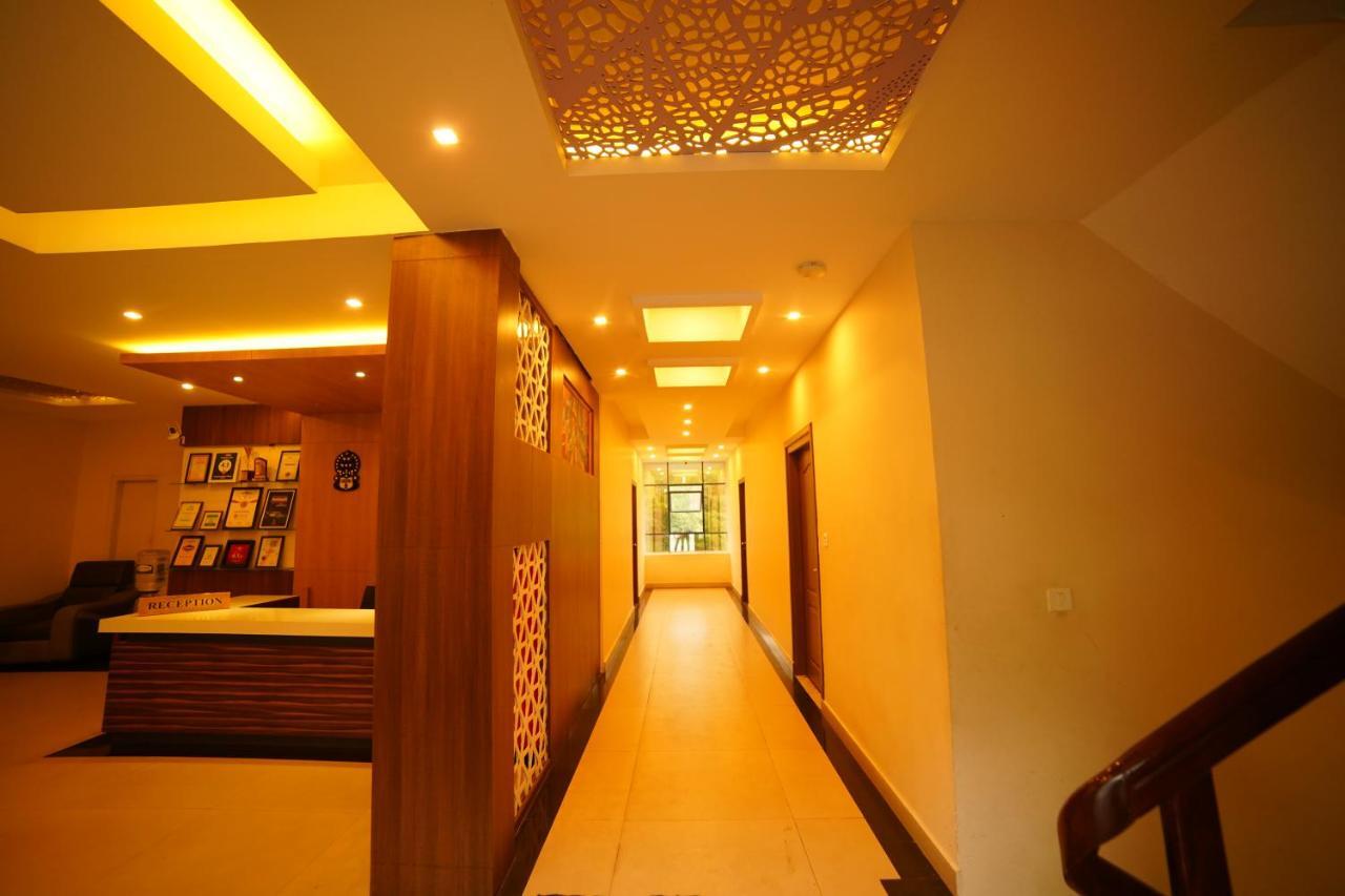 Del-679 Hotel Munnar Bagian luar foto